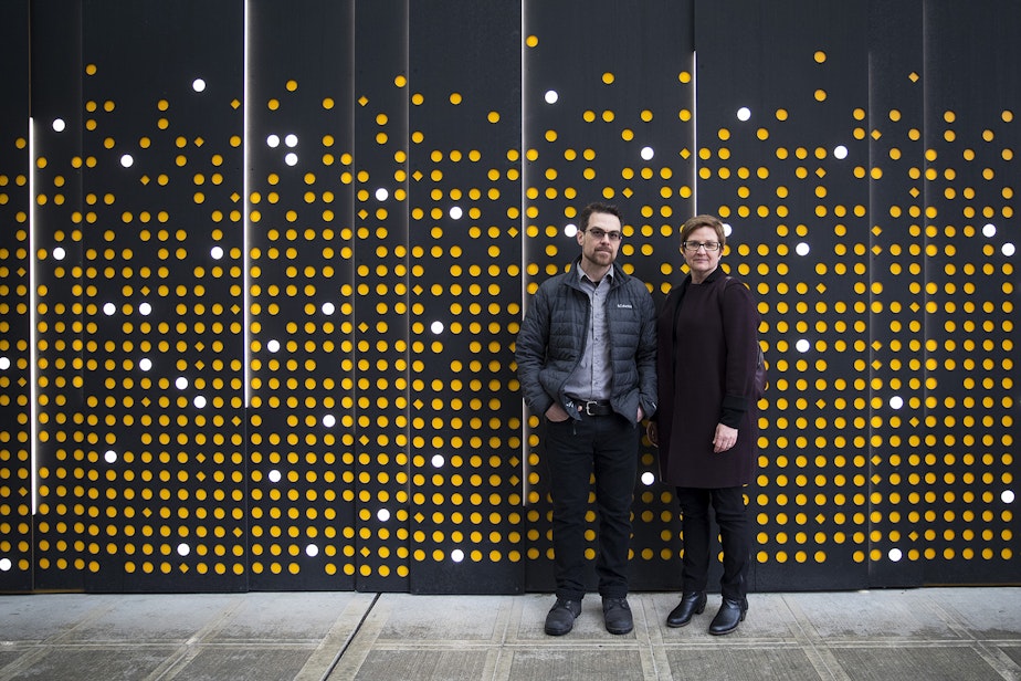 caption: Carolyn Adolph and Joshua McNichols, hosts of KUOW's Primed podcast, pose for a portrait on Thursday, January 24, 2019, at Amazon's spheres in downtown Seattle.